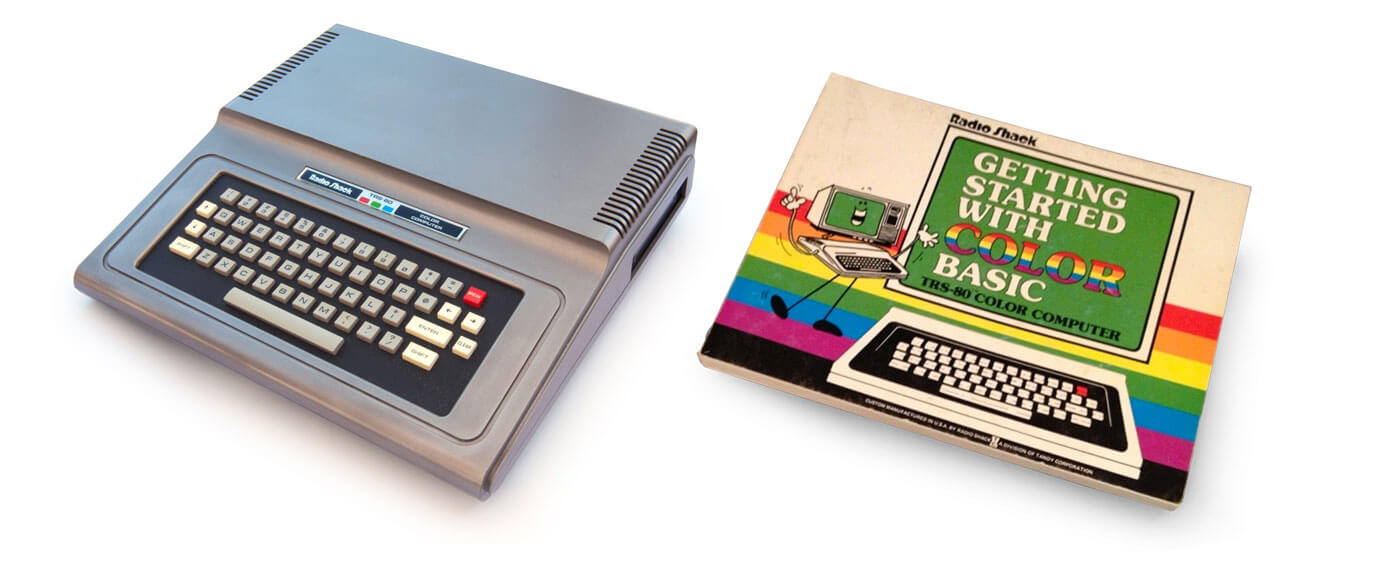 TRS-80 computer and book
